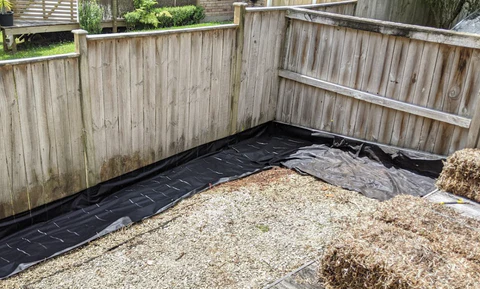 photo of a lay down a weed barrier